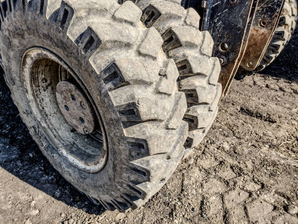 istock the wheels of an excavator 1387058942