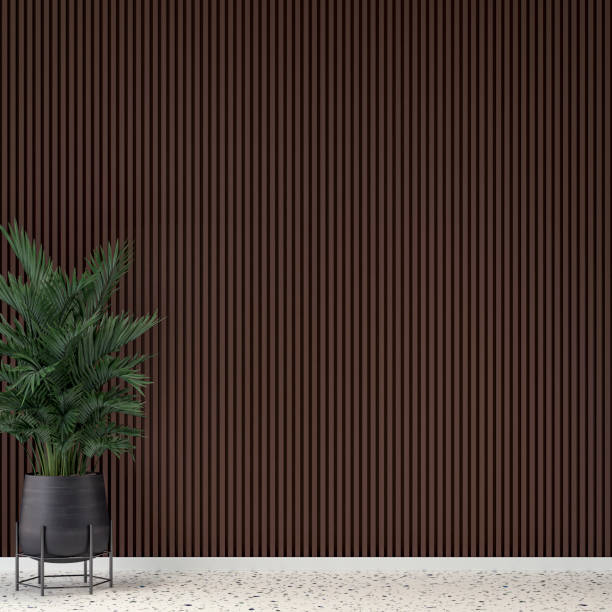istock Empty unfurnished elegant interior with chocolate brown paneled wall background and potted plant (palm tree) 1387060170