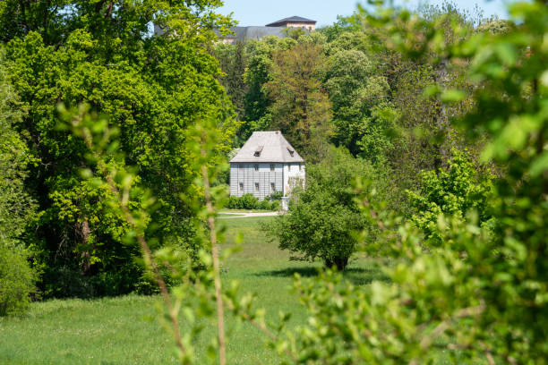 Weimar, Germany - May 13, 2019: Image of Goethe’s Garden House in the park by the river Ilm in Weimar during springtime. Goethe lived in this building until 1782, and also helped landscape the park. Goethe was one of the key figures of German literature.