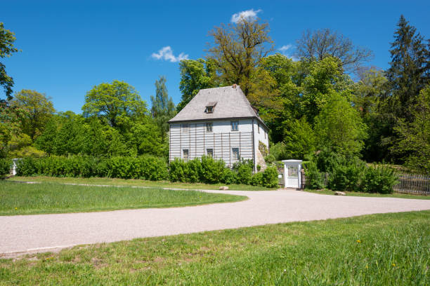 Weimar, Germany - May 13, 2019: Image of Goethe’s Garden House in the park by the river Ilm in Weimar during springtime. Goethe lived in this building until 1782, and also helped landscape the park. Goethe was one of the key figures of German literature.