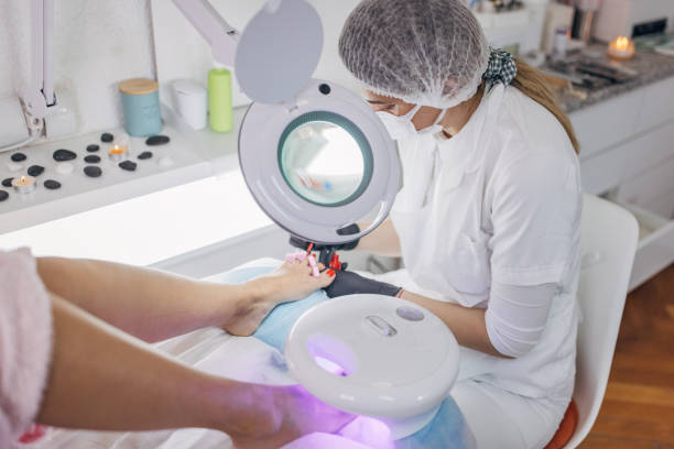 istock Woman having pedicure treatment 1387065768