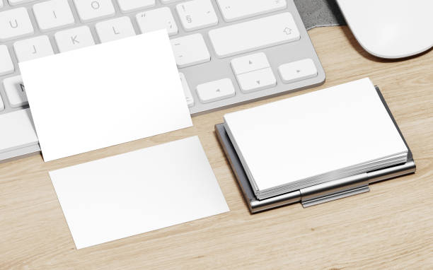 istock Professional business card design mockup on table with computer in luxury studio scene. 1387072600