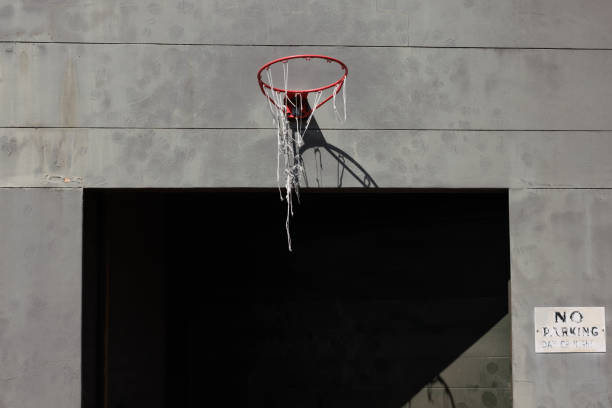 Close-up of Basketball hoop on a concrete wall with copy space.