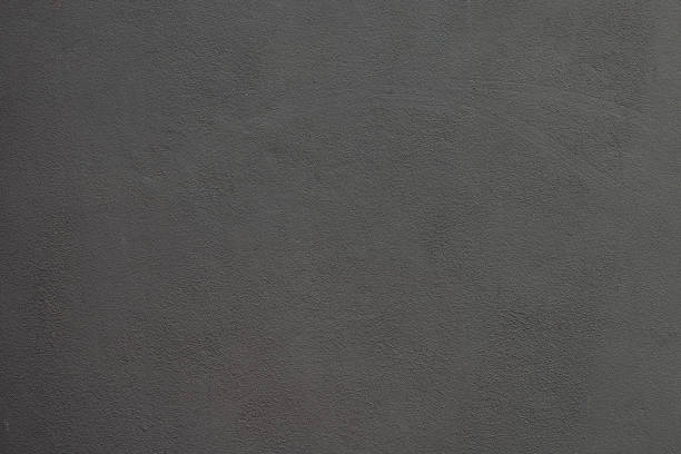 Part of a painted concrete wall.
