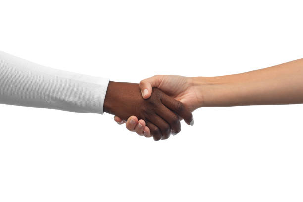 istock handshake of black and white hands 1387073097