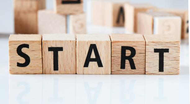istock START word composed of wooden blocks. 1387076329