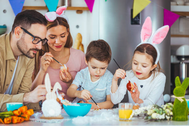 istock Happy family spending Easter together in the kitchen 1387076463