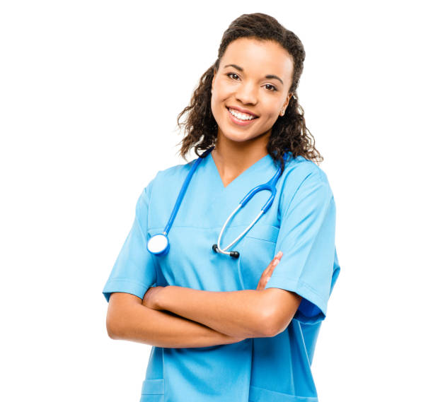shot of a young female nurse posing against a studio background - isolated on white young adult beautiful people curly hair imagens e fotografias de stock