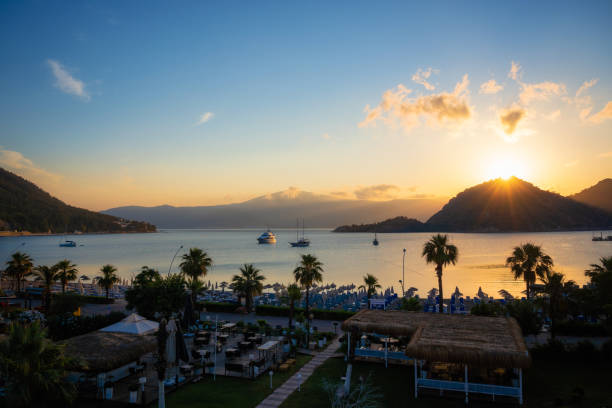 Icmeler Beach in Marmaris at sunrise Icmeler Beach in Marmaris at sunrise, Turkey marmaris stock pictures, royalty-free photos & images