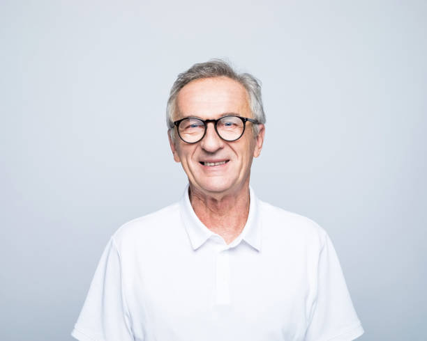 istock Smiling retired senior man wearing eyeglasses 1387080065