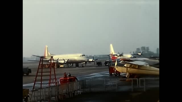 Turin airport with airplane from the 1960s