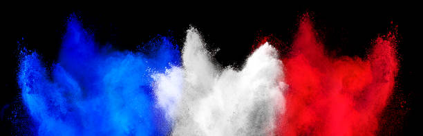 colorful french tricolore flag green white red color holi paint powder explosion isolated black background. france europe travel tourism concept stock photo