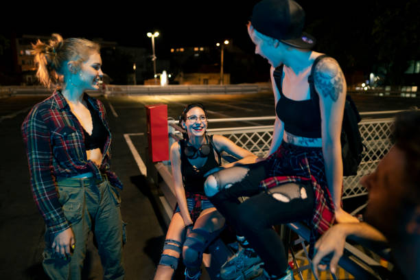 istock Group of roller skaters together outdoors 1387080540