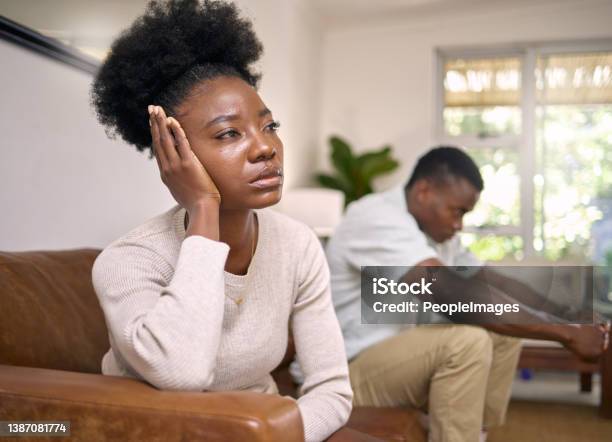 Shot Of A Young Couple In An Argument At Home Stock Photo - Download Image Now - Couple - Relationship, Arguing, Fighting