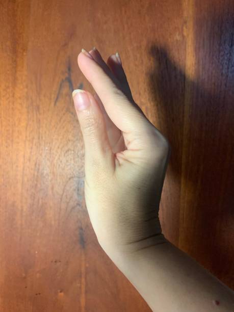 istock Delicate hand of a woman 1387081973