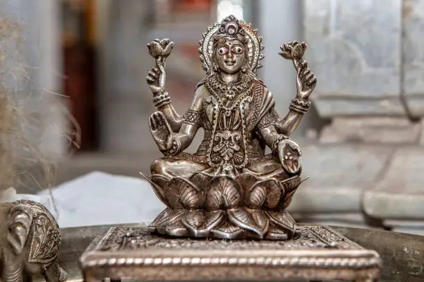 the Godsess of prospority and wealth is a Hindu idol, mede of pure silver. An antique small idol kept and worshipped inside of a temple.