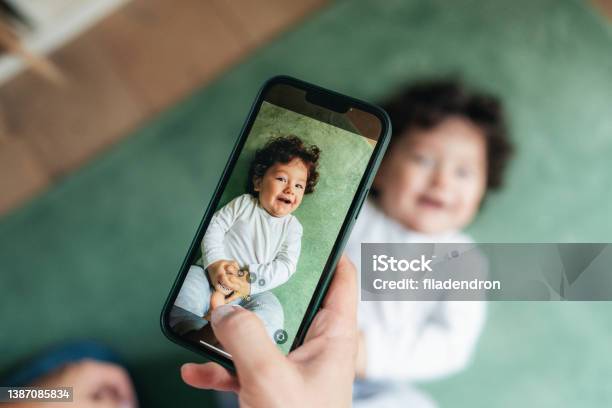 Mother Taking Photo Of Her Baby Stock Photo - Download Image Now - Photographing, Baby - Human Age, Social Media