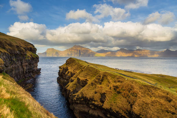 istock Sunset over a volcanic archipelago, Faroe Islands. 1387088538