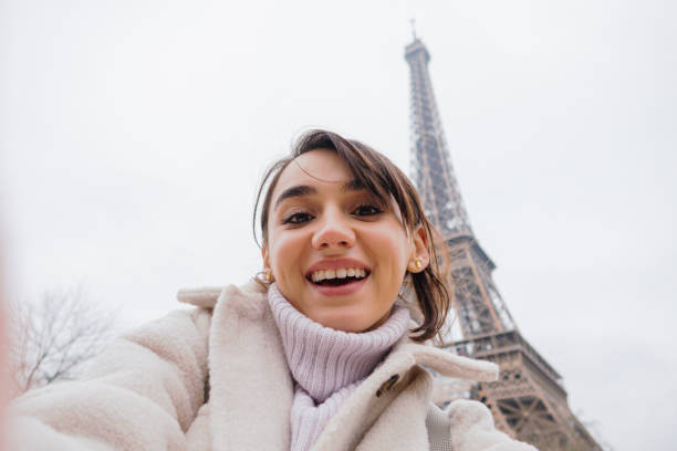 istock Selfie in front of The Eiffel Tower 1387091225