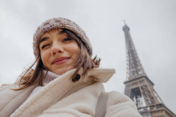 istock Selfie in front of The Eiffel Tower 1387091243