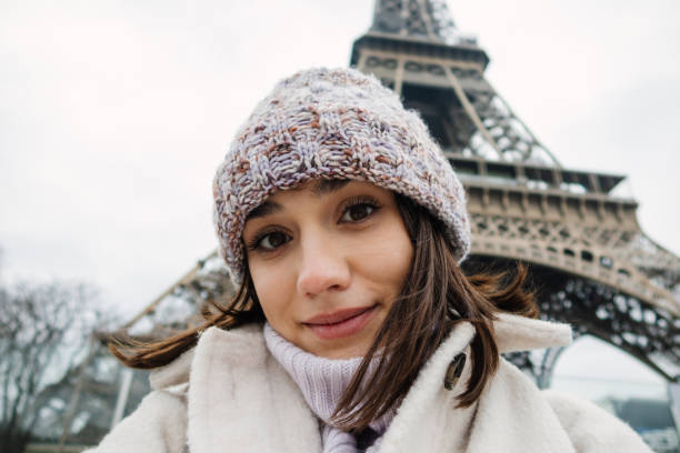 istock Selfie in front of The Eiffel Tower 1387091358