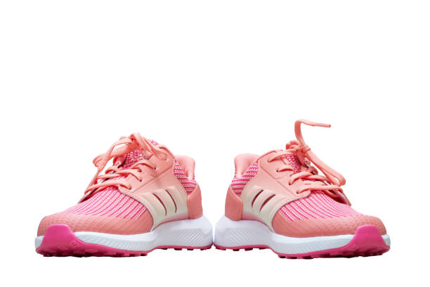 istock pink sport shoes on white isolated background 1387094824