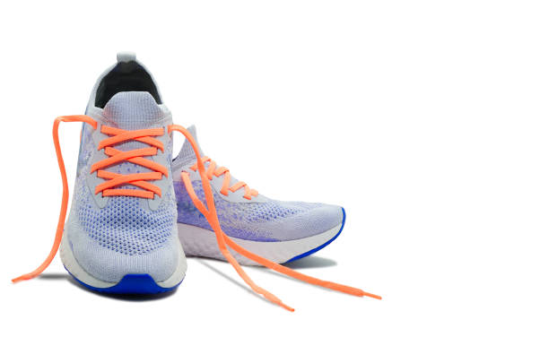 istock Shoelaceless running shoes on isolated white background with copy space 1387094921
