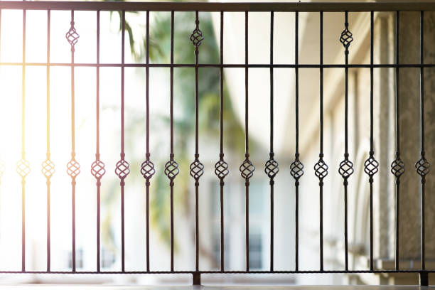 istock Steel window grating on house veranda for security and beautiful concept with sun 1387094978