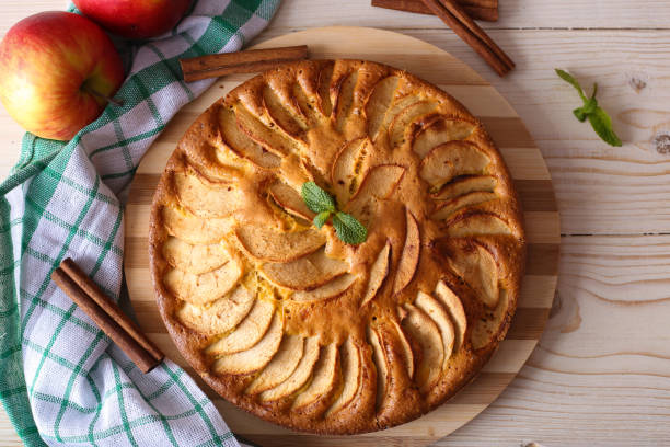istock Appetizing pie close-up on a wooden background 1387096237