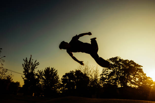 istock Well built person exercising parkour 1387096973