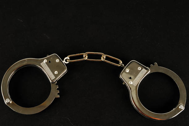 istock Close-up of handcuffs 1387099152