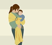 istock Mother babywearing. Family portrait of mother and baby 1387103396