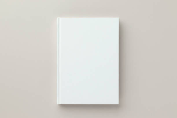 white book capa em branco mockup em um fundo bege, lay flat lay, mockup - brochura - fotografias e filmes do acervo