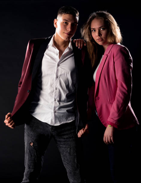 istock Trendy young couple 1387105172