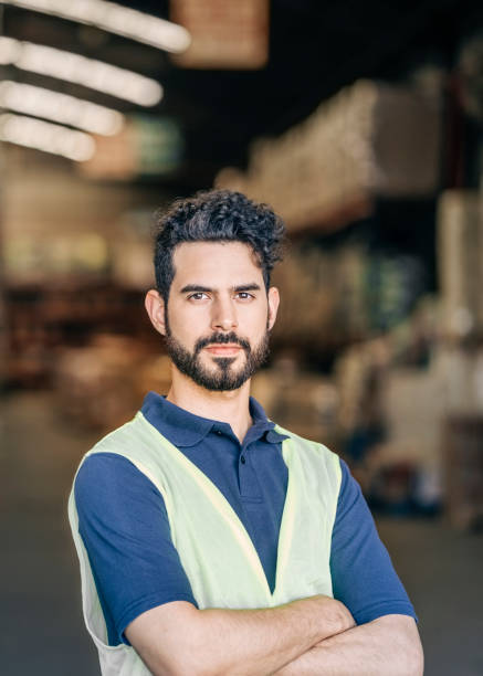 istock Portrait of a confident warehouse worker 1387105325