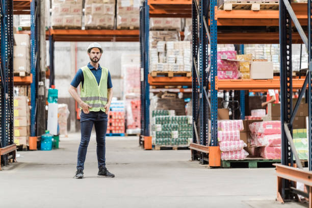 istock Portrait of a young man working in warehouse 1387105339