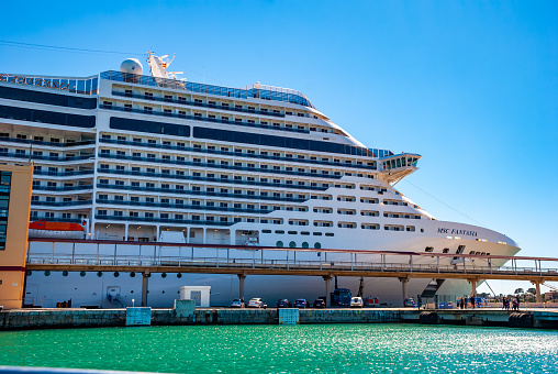 MSC Fantasia cruise ship at Palma, Majorca Habor, view from the right side during daylight with clear sky, view from low angle