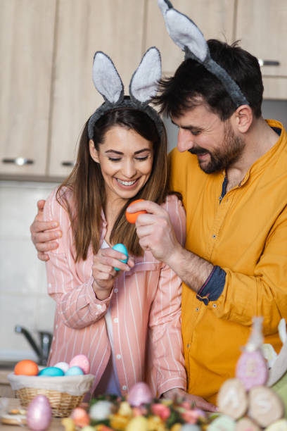 istock Young couple cracking eggs as a part of Orthodox Greek tradition for Easter 1387108323