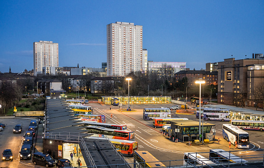 Buses from a variety of operators waiting in Buchanan Bus Station, Glasgow's main bus station, located in the city centre.