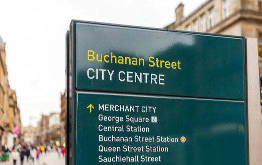 A sign with information about local attractions on Buchanan Street in the city centre of Glasgow.