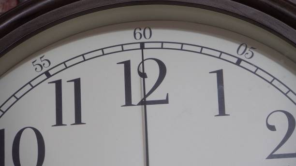 istock Wall clock with a light dial. Retro style. The movement of time 1387112273
