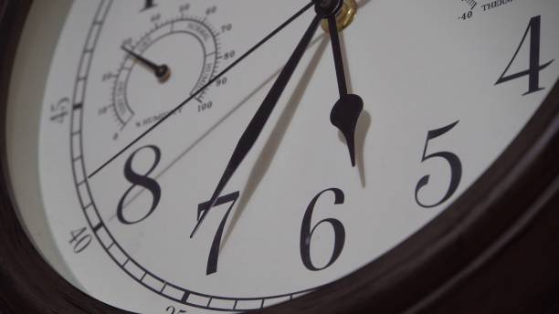 istock Wall clock with a light dial. Retro style. The movement of time 1387112285