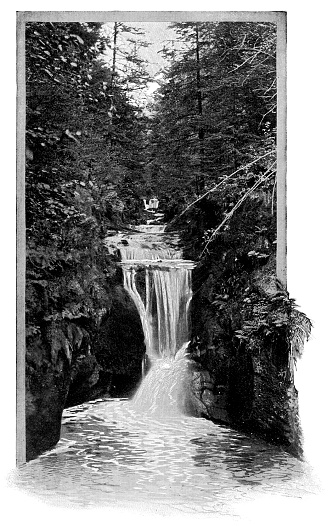 Geroldsau Waterfall in the Black Forest mountain range at the Great Spa Town of Baden-Baden in Baden-Württemberg, Germany. Vintage halftone etching circa 19th century. Baden-Baden is of the 11 Great Spa Towns of Europe.