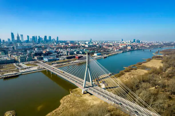 The Świętokrzyski Bridge is one of the most beautiful bridges in Warsaw. It connects both banks of the Vistula River in the area of Powiśle.