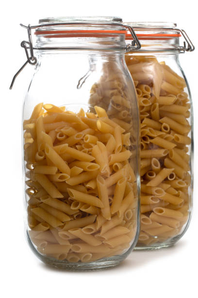 istock Penne pasta in a glass jar 1387116047