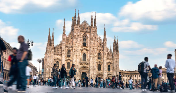 istock Duomo square in Milan crowded at sunset 1387116149