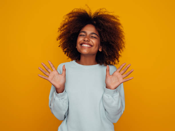 istock Beautiful girl with curly hairstyle 1387123904