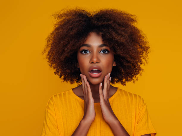 istock Beautiful girl with curly hairstyle 1387124014