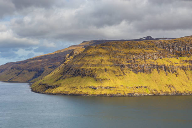 istock Sunset over a volcanic archipelago, Faroe Islands. 1387126951