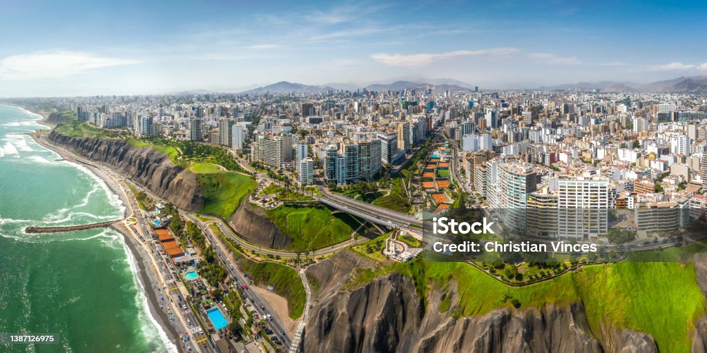 Aerial view of Lima city, Peru LIMA, PERU: Aerial view of Miraflores town, cliff and the Costa Verde high way Lima - Peru Stock Photo